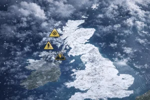 UK map overlaid with snow and ice weather warnings during winter storm